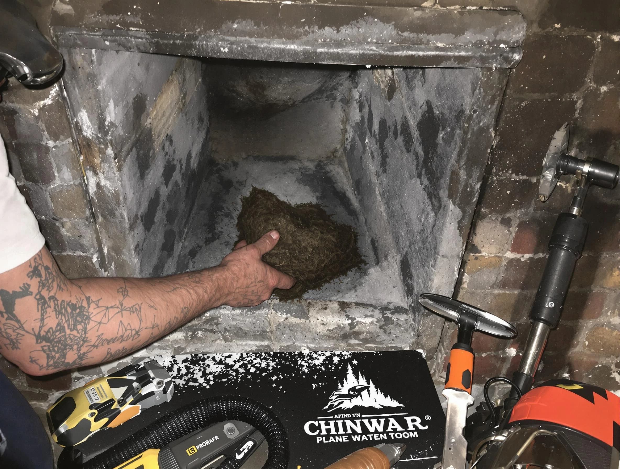 Douglasville Chimney Sweep safely removing debris and screening chimney in Douglasville, GA